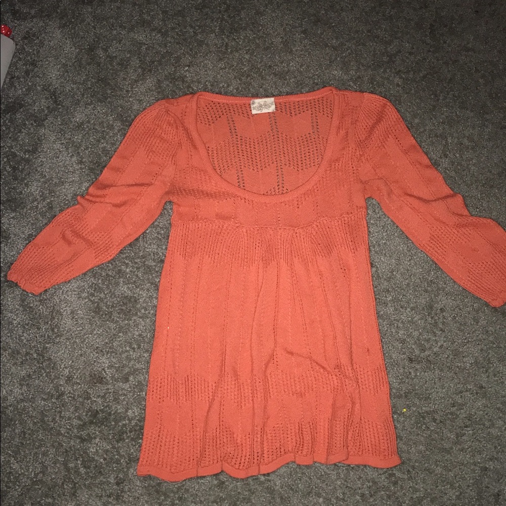 Orange/reddish tee shirt